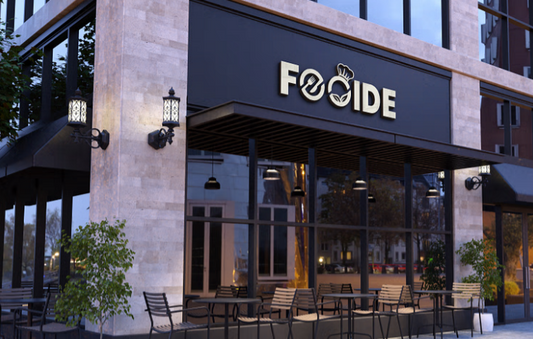 Restaurant exterior with 'FOOIDE' sign above outdoor seating area